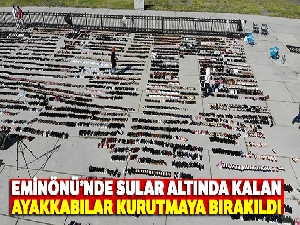 Eminönü'nde sular altında kalan ayakkabılar Yenikapı'da kurutmaya bırakıldı