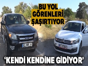 Bu yolda arabalar rampa yukarı kendi kendine gidiyor