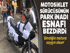 Motosiklet sürücüsünün park inadı esnafı bezdirdi