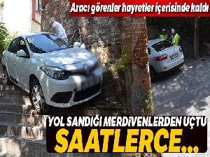 Yol sandığı merdivenlerden uçtu, saatlerce aracın üzerinde bekledi