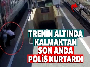 Yaşlı adamı trenin altında kalmaktan son anda polis kurtardı
