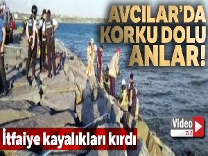 Avcılar'da denize düşen genç kayalıklara sıkıştı