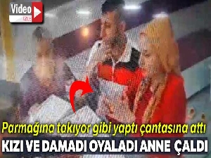 Kızı ve damadı oyaladı, anne yüzüğü çaldı