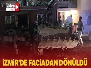 Park halindeki kepçe 5 katlı binaya daldı