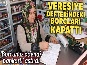 Veresiye defterindeki borçları kapattı, 'Borcunuz ödendi pankartı' astırdı