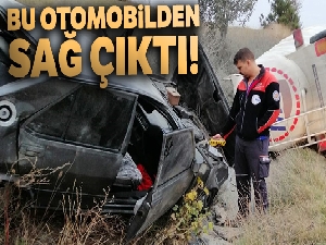 Paramparça olan otomobilden sağ kurtuldu