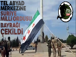 Tel Abyad merkezine Suriye Milli Ordusu bayrağı çekildi