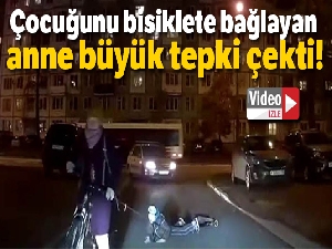 Rusya'da çocuğunu bisikletine bağlayan anne tepki çekti