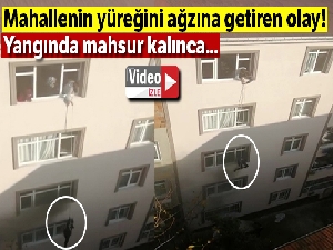 Yangında mahsur kalan hamile kadın ip yardımıyla kurtarıldı