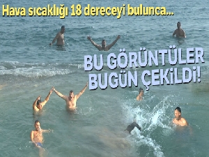 Mersin'de hava sıcaklığı 18 dereceyi buldu, vatandaşlar denize girdi