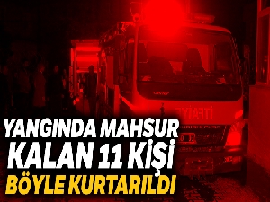 Adana'da yangında mahsur kalan 11 kişi kurtarıldı