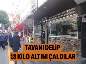 Bilardo salonunun tavanını delip kuyumcudan 18 kilo altını çaldılar