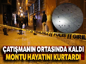 Çatışmanın ortasında kaldı, montu hayatını kurtardı