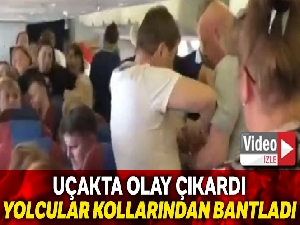 Rusya'da uçakta olay çıkaran yolcuya ‘bantlı' müdahale