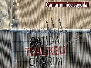 İş yeri çatısında tehlikeli onarım