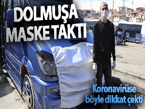 Korona virüse dikkat çekmek için dolmuşuna maske taktı