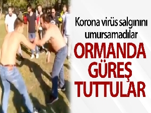 'Evde kalın' uyarısına rağmen ormanda güreş tuttular