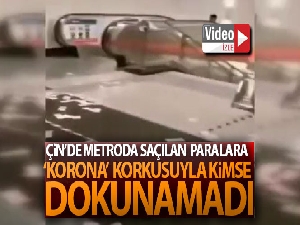 Çin'de metroda saçılan paralara 'korona' korkusuyla kimse dokunamadı
