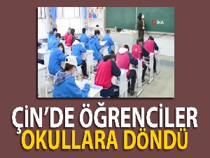 Çin'de öğrenciler okullara döndü