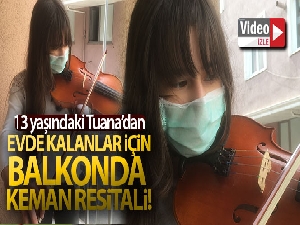 Evde kalanlar için balkonda keman resitali