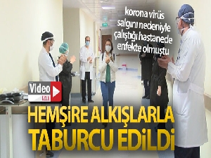 Korona virüs tedavisi tamamlanan hemşire alkışlarla taburcu edildi