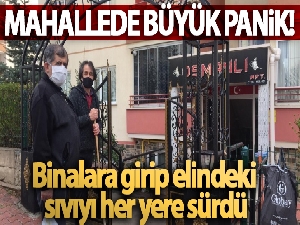 Binalara girip elindeki sıvıyı her yere süren kadın panik oluşturdu