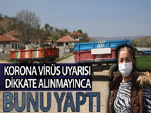 Korona virüs uyarı tabelası dikkate alınmayınca köyü römorkla kapadı