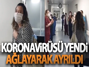Koronavirüsü yenen hemşire meslektaşlarının alkışlarıyla, ağlayarak hastaneden ayrıldı