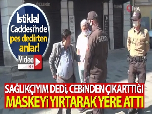 Sağlıkçıyım dedi, bekçiye kızarak maskeyi yırtıp yere attı