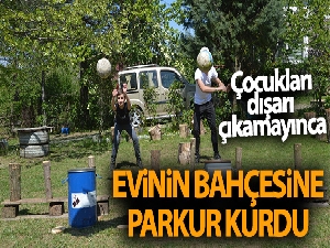 Sokağa çıkamayan çocukları için evinin bahçesine oyun parkuru kurdu