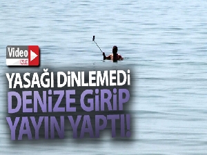 Yasağı dinlemedi denize girip Kamboçyada'ki arkadaşına yayın yaptı