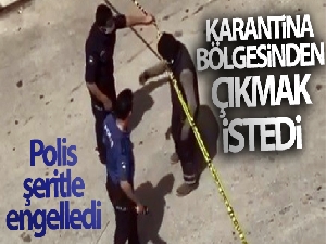 Karantina bölgesinden çıkmak isteyen adamın sosyal mesafe ihlaline polisten güvenlik şeritli çözüm