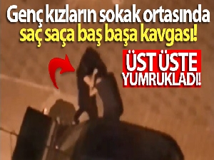 Genç kızların sokak ortasında saç saça baş başa kavgası