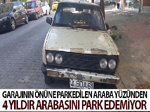 Garajının önündeki araba yüzünden 4 yıldır otomobilini park edemiyor