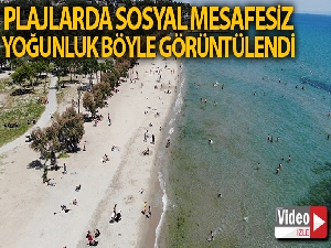 Halk plajındaki sosyal mesafesiz yoğunluk havadan görüntülendi