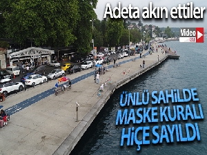 İstanbul'un ünlü sahiline akın eden vatandaşlar, maske kuralını hiçe saydı