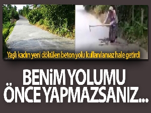 Yaşlı kadın yeni dökülen beton yolu kullanılamaz hale getirdi