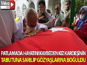 Patlamada ölen kız kardeşinin tabutuna sarılıp gözyaşlarına boğuldu