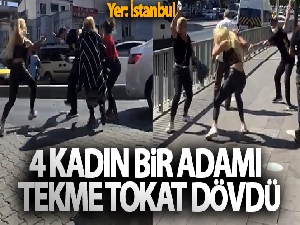 Dört kadın yol ortasında bir adamı tekme tokat dövdü