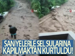Saniyelerle sel sularına kapılmaktan kurtuldu