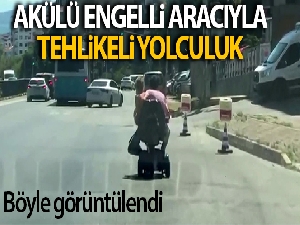 Akülü engelli aracıyla tehlikeli yolculuk kamerada