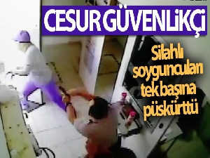Cesur güvenlikçi silahlı soyguncuları tek başına püskürttü