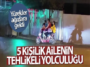 Motosiklette 5 kişilik ailenin tehlikeli yolculuğu kamerada