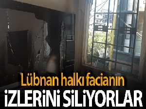Lübnan'daki patlama sonrası halk faciadan kalan izleri silmeye çalışıyor