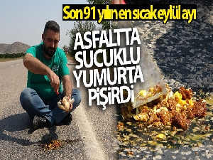 Asfaltta sucuklu yumurta pişirdi