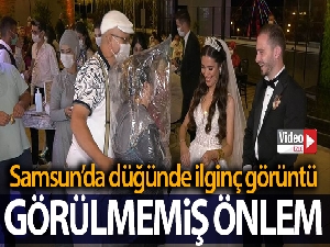 Düğünde görülmemiş önlem: Kafasına poşet geçirip gelin ve damada sarıldı