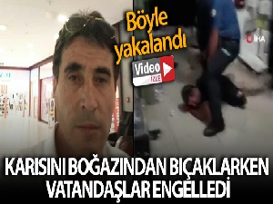 Karısını boğazından bıçaklayan adamı vatandaşlar engelledi