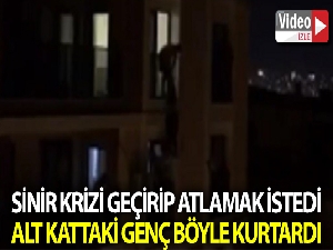 Sinir krizi geçirerek 5. kattan atlamaya kalkan kadını alt kattaki genç kurtardı