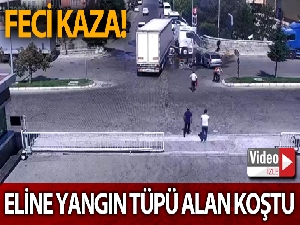 Kazayı gören eline yangın tüpü alarak koştu