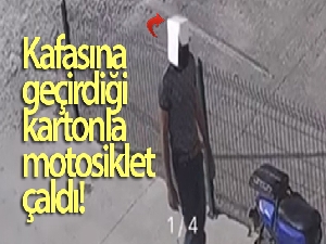 Kafasına geçirdiği kartonla motosiklet çalan şüpheli kamerada